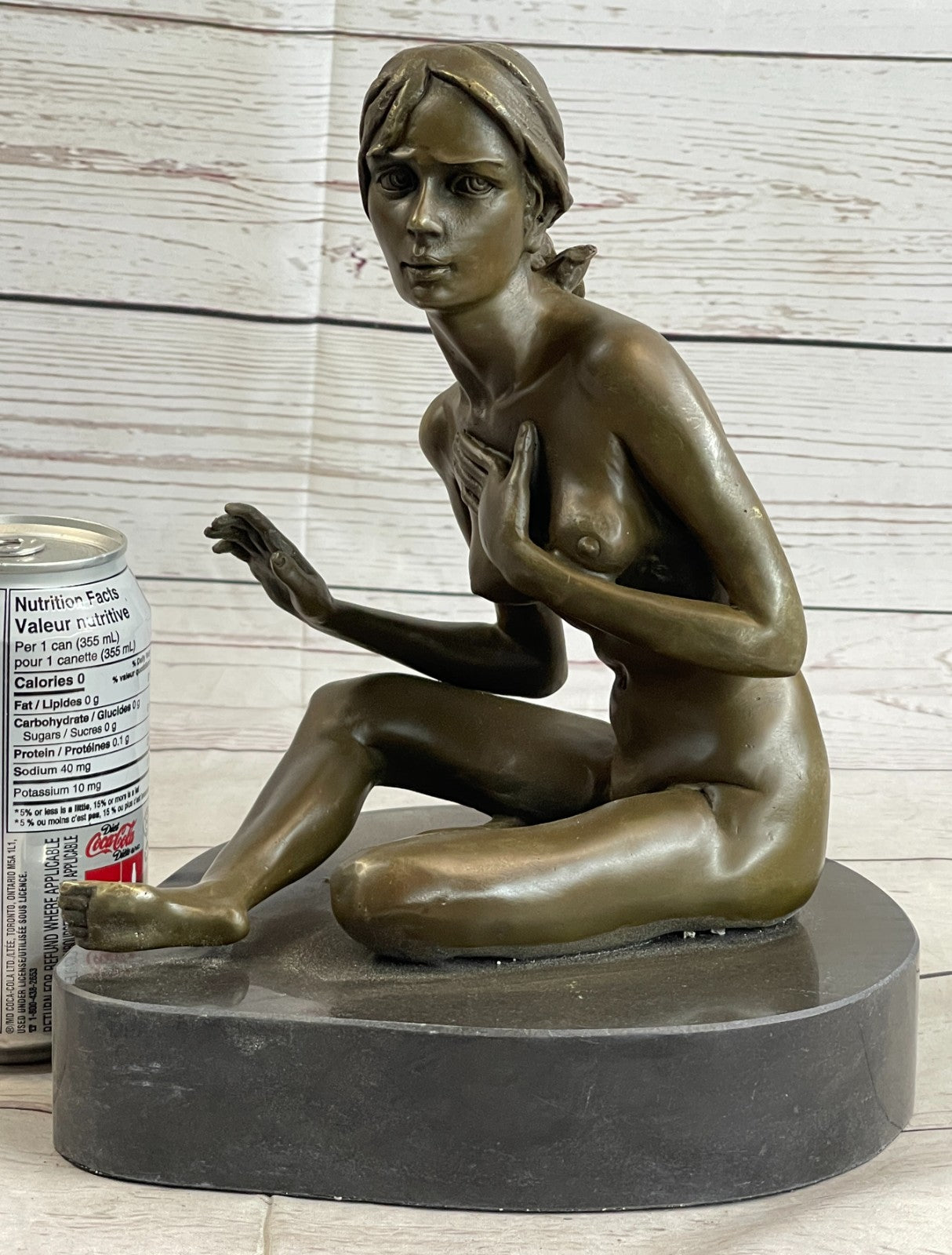 GENNARELLI Art Deco bronze of a nude woman Touching her Breast, marble base.