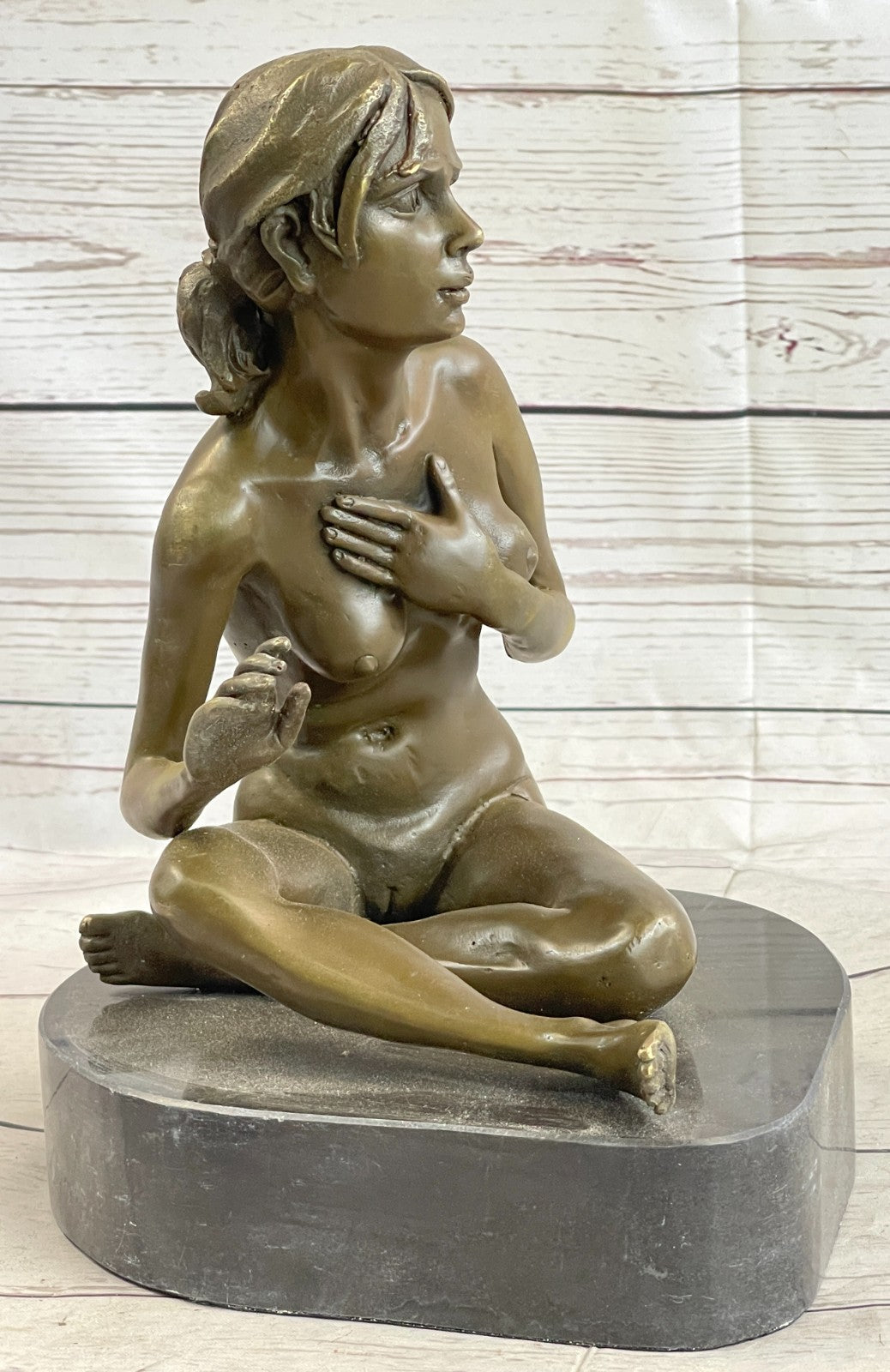 GENNARELLI Art Deco bronze of a nude woman Touching her Breast, marble base.