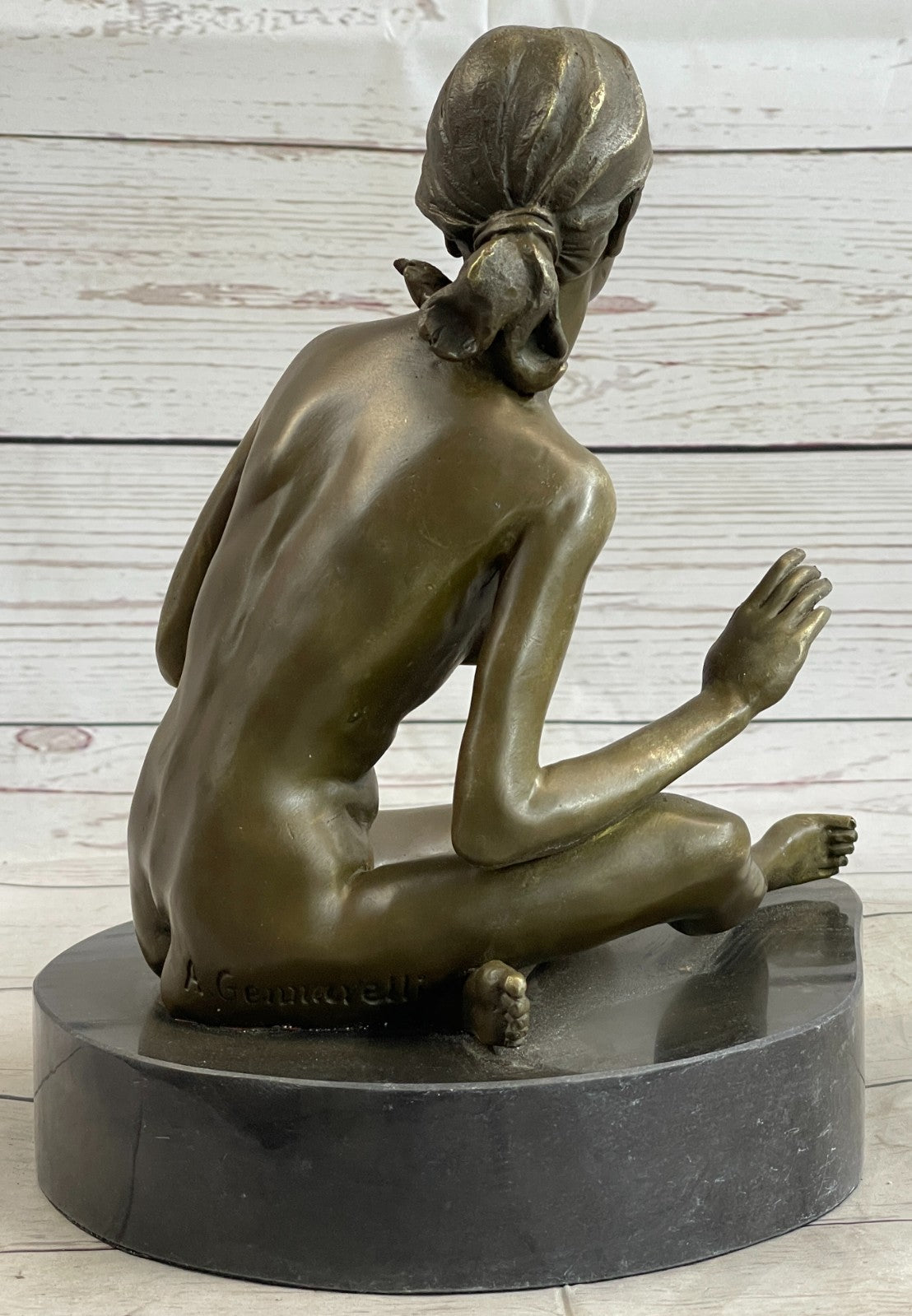 GENNARELLI Art Deco bronze of a nude woman Touching her Breast, marble base.