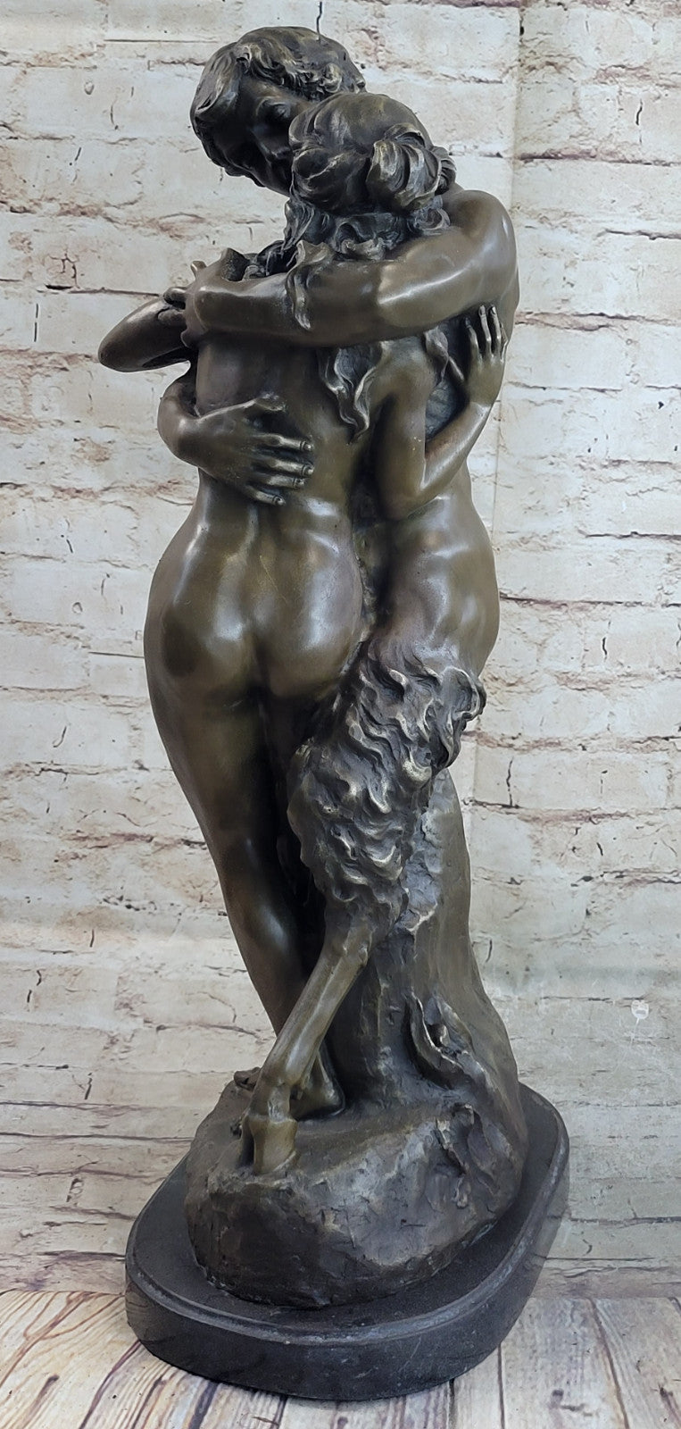 Greek God Pan Faun charms his way in the Arms of a Nude Woman  Bronze Statue